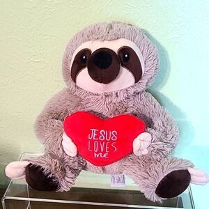 Cuddly Sloth Stuffed Animal Holding a Red Heart That Reads Jesus Loves Me